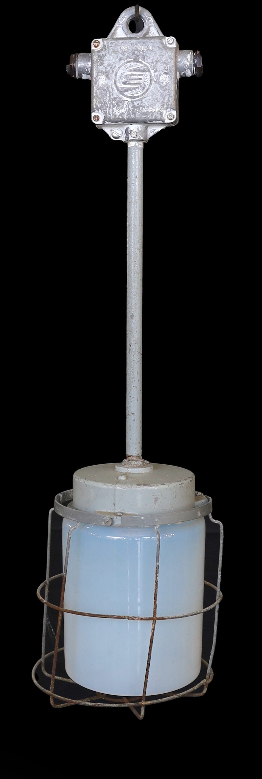 A pair of Czechoslovakian painted alloy industrial ceiling lights with caged Vaseline glass shades, height 74cm. width 21cm